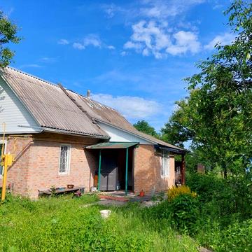 Продається земельна ділянка 12,7 соток з дачним будинком
