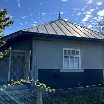 Житловий будинок з господарськими будівлями та спорудами