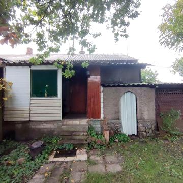 Частина будинка з землею в центральній частині Конотопа Власник