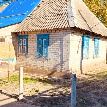 Продаж землі з будинком