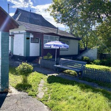 Будинок з усіма зручностями + земля в центрі м. Лубни.