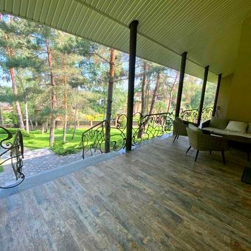 Сучасний будинок з ділянкою 23 сотки. Бучанський