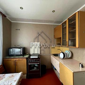 Милославська вул., 33