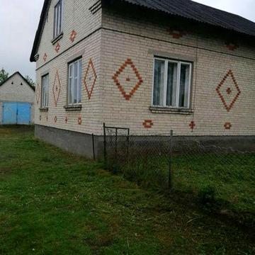 Земельна ділянка з будинком