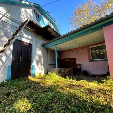 Будинок із літньою кухнею