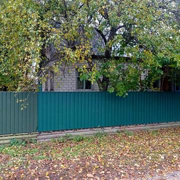 Двоповерховий будинок в Городні на два входи.