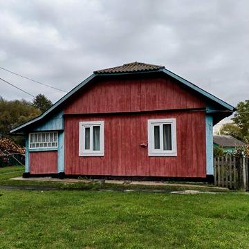 Продається доглянутий деревяний будинок в селі Доброва