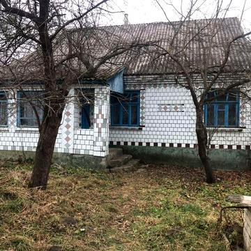 Будинок з земельною ділянкою