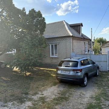 Дом + гараж в центральной части города