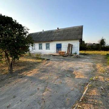 Терміново продам будинок із землею