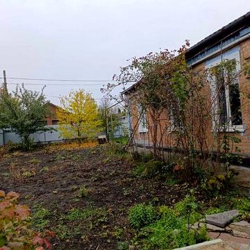 Продам земельну ділянку 11 соток та частину будинку по вул . Барболіна