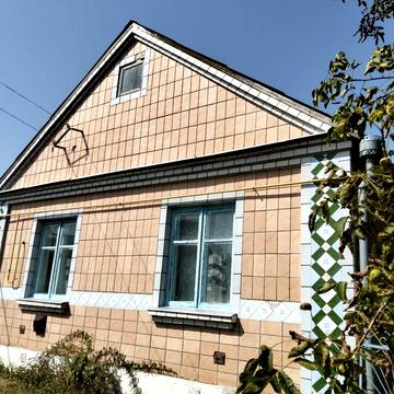 Будинок в Луцькому районі з господарськими будівлями