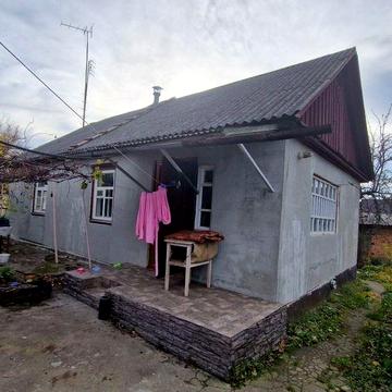 Теплий будинок 57м² біля базару,6 соток, гараж, всі зручності.