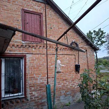 Поділ, вул. Великорогізнянська, частина будинку