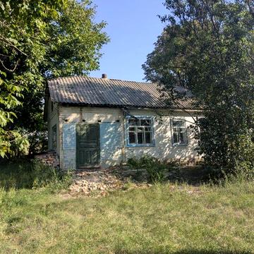 Будинок у центрі Петропавлівки, 20 соток городу, під ремонт