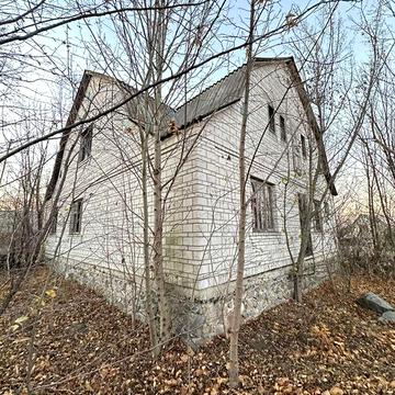 Земельна ділянка з будинком