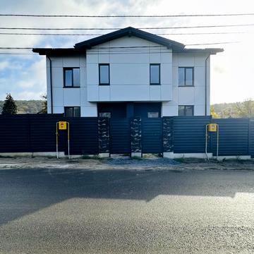 Є. Коновальця