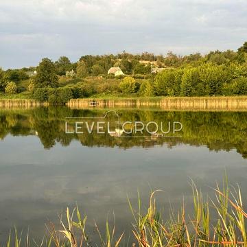 Без% Ділянка з виходом до річки + хата-мазанка. Всі комунікації