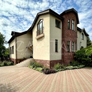 Будинок з бомбосховищем та гаражем в Козині/Конча-Заспа/