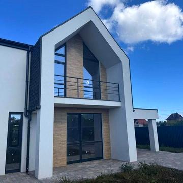 Сучасний будинок у передмісті — простір, якість і комфорт