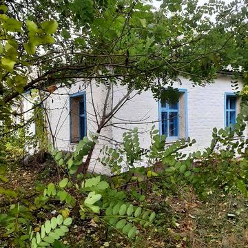 Будинок та земля 0,567 га