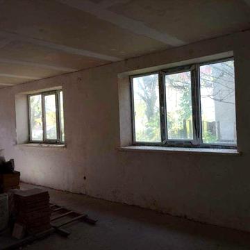 половина будинку в центрі м. Хмільника,  можливо під комерцію