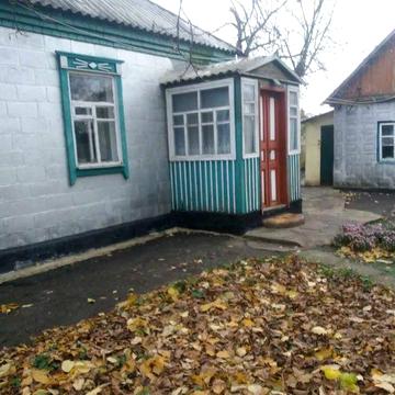 Продам будинок в Сахновщині біля стадіону, підходить під бізнес