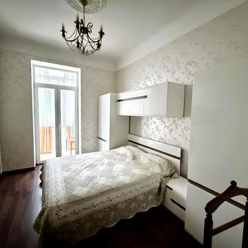 Євгена Коновальця вул. (Щорса), 21