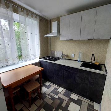 Олімпійська вул., 16