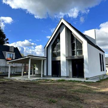 Кирпичный дом в скандинавском стиле в закрытом коттеджном городке