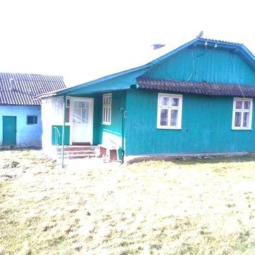 Продаж деревяного будинку