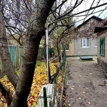 Продам будинок з гаражем (Новомиколаївка біля 4 лікарні)