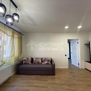 Домобудівельна вул., 11