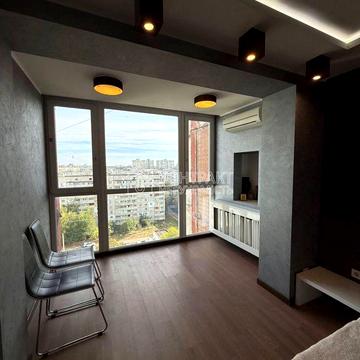 Олімпійська вул., 9