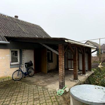 Продам пів будинку. В м. Малин