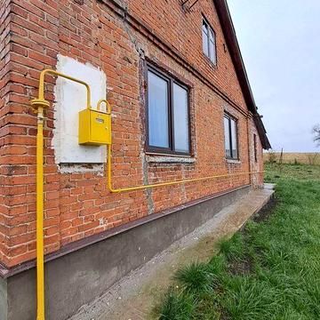Продаж цегляного будинку