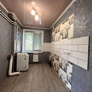 Першотравнева вул., 48