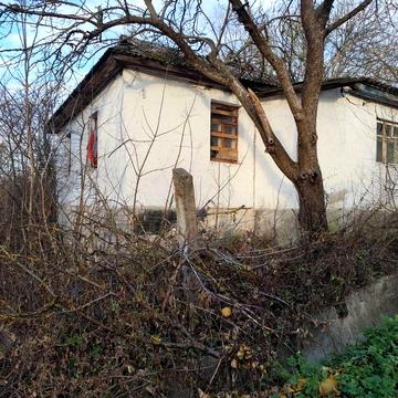 Продається пів будинку в центрі с.м.т.Віньківці