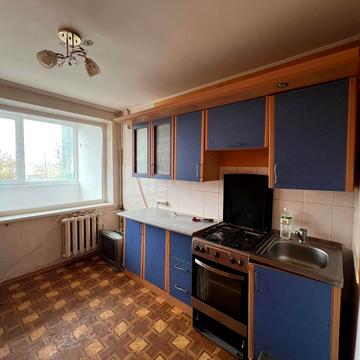 Жоліо Кюрі вул., 52