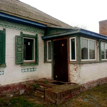 Продаж цегляного будинку