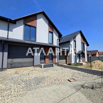 Таунхаус з гаражем, підвалом і місцем під авто на вул. Горіхівській