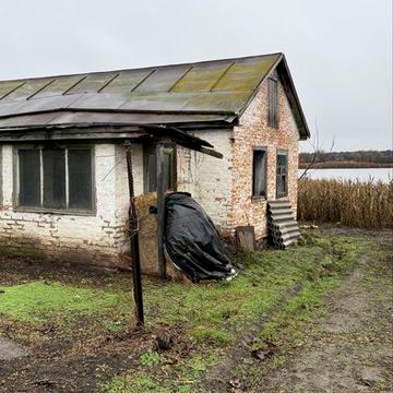 Ділянка з будинком