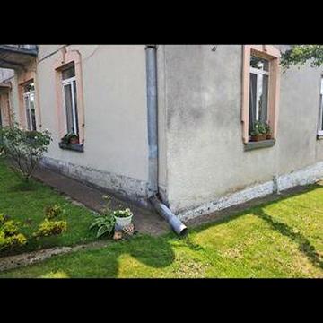 Продається квартира з прибудовою  та огородженою територією