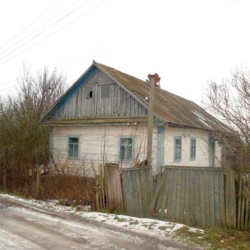 Старовинний дерев`яний будинок