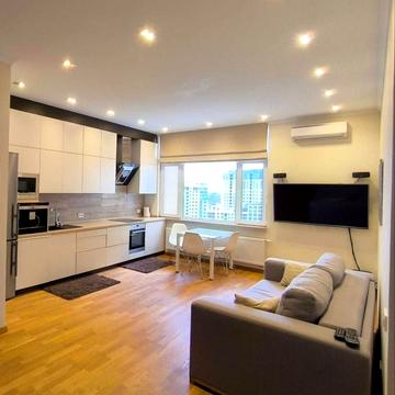 Євгена Коновальця вул. (Щорса), 36-Е