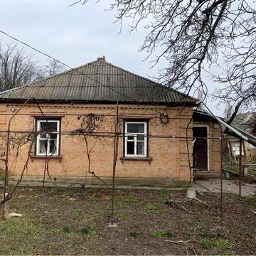 Продам будинок та земельну ділянку по вулиці Міхновського.