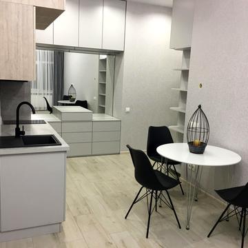 Євгена Коновальця вул. (Щорса), 36-Е