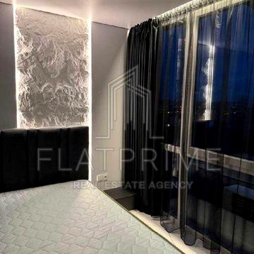 Олега Мудрака вул. (Генерала Наумова), 1-Б