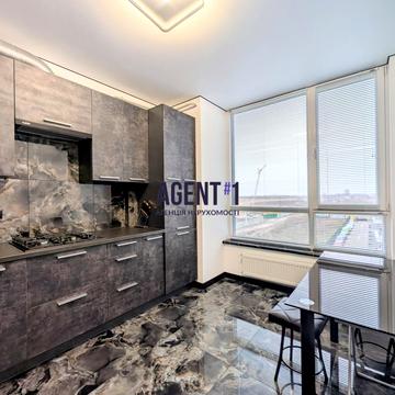 Будівельна вул., 2