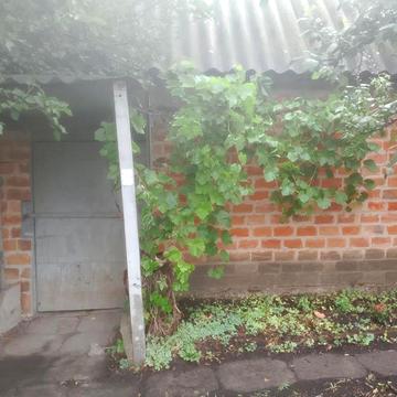 Земельна ділянка з будинком